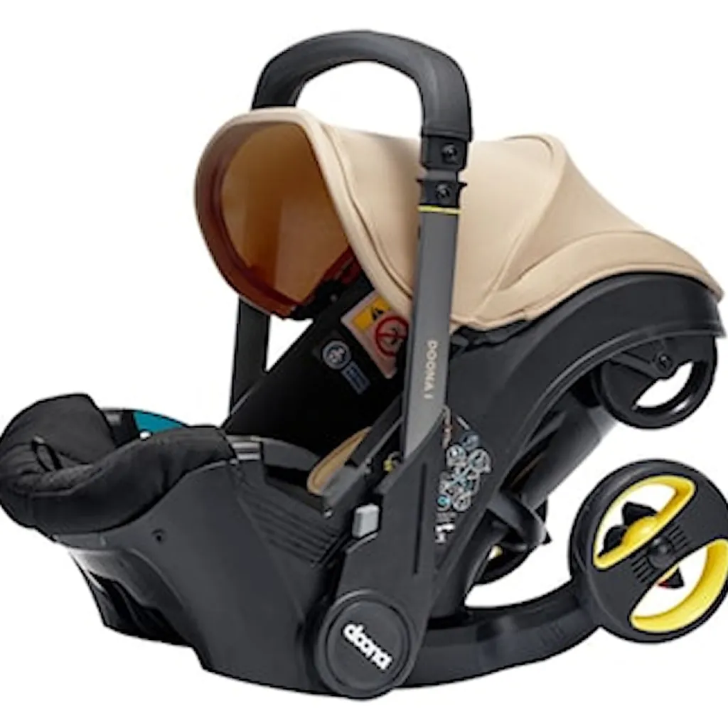 Clearance i Babyskydd Sahara Sand Barn Bilbarnstolar