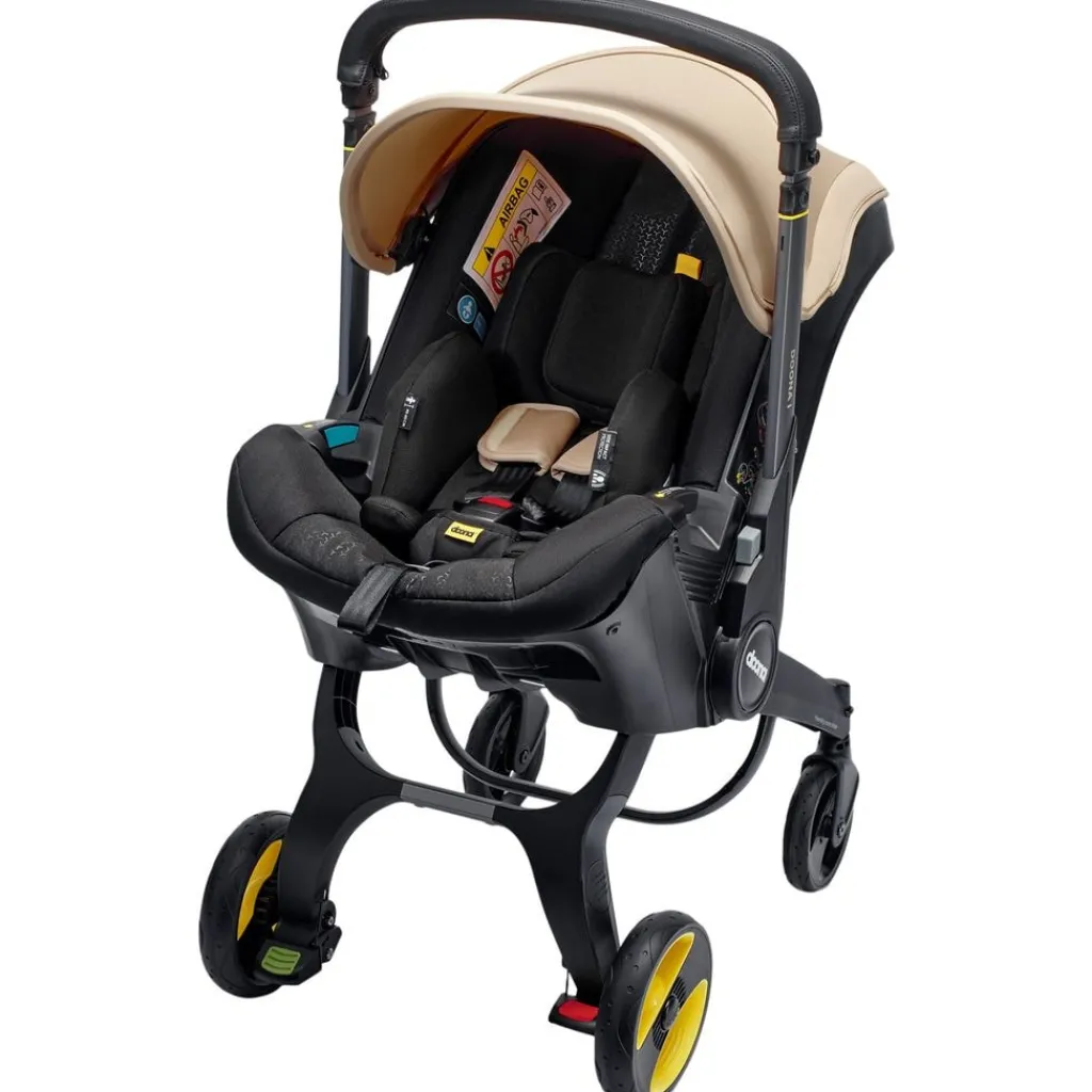 Clearance i Babyskydd Sahara Sand Barn Bilbarnstolar
