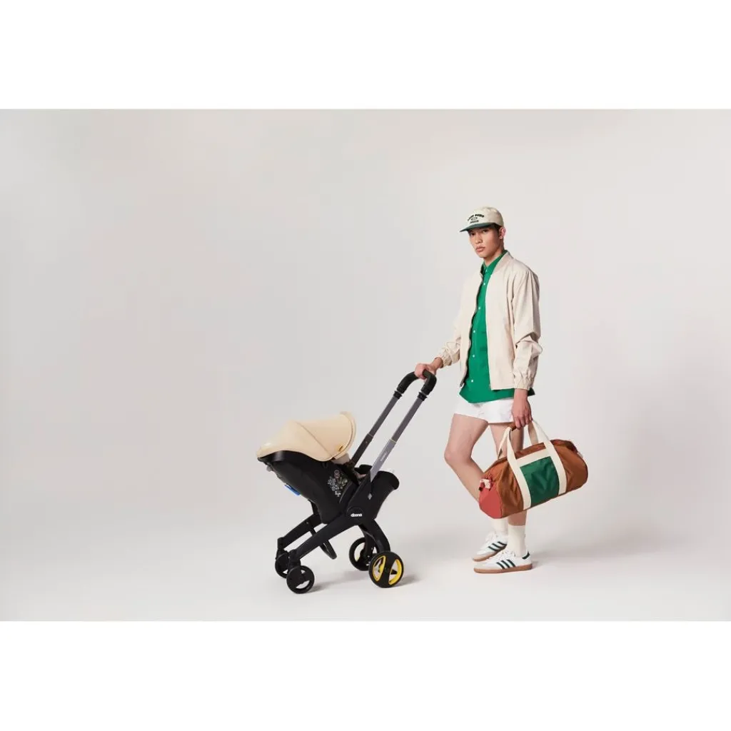 Clearance i Babyskydd Sahara Sand Barn Bilbarnstolar